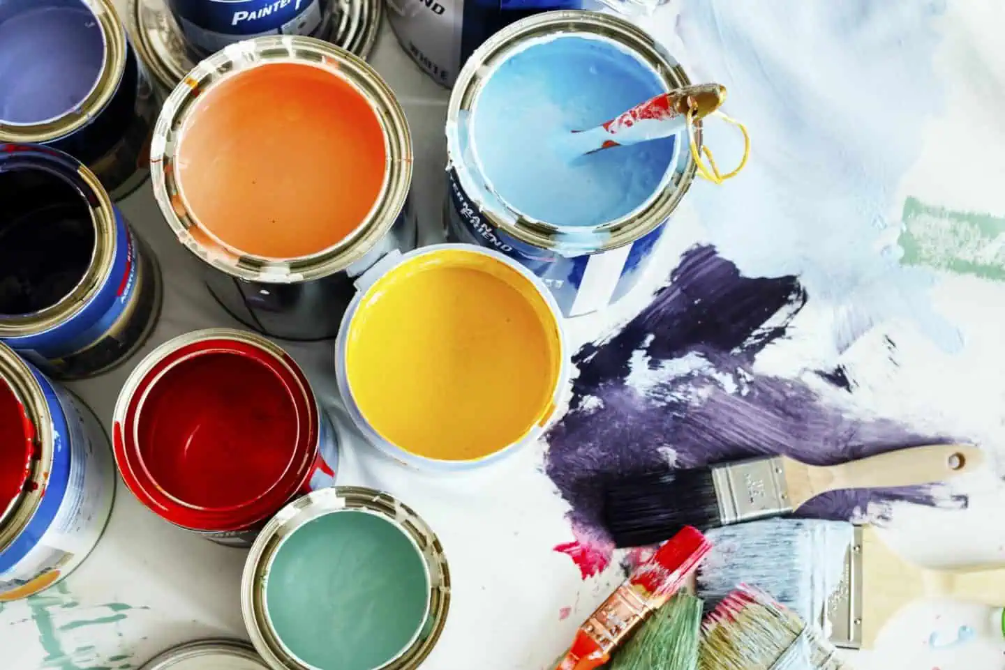 High-quality paint cans with vibrant colors for interior and exterior decorating projects.